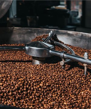 A compact dust capture project for a food ingredient transfer and packaging zone.