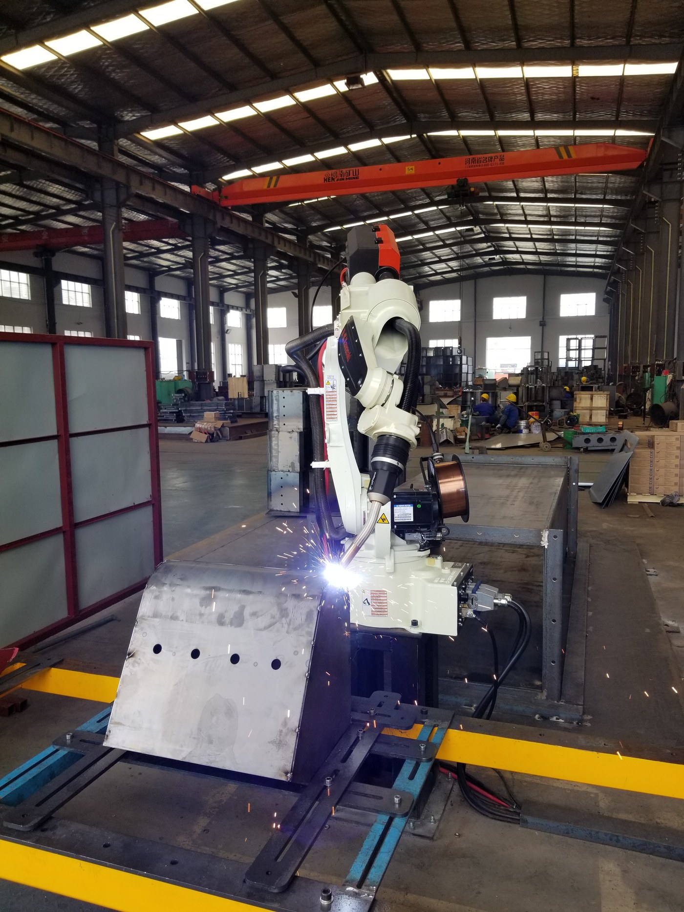 Robotic welding station